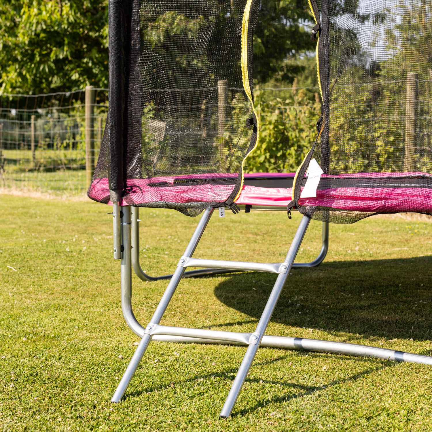 Pacote Premium Trampolim 245cm reversível rosa / cinzento CANBERRA + rede, escada, cobertura e kit de ancoragem