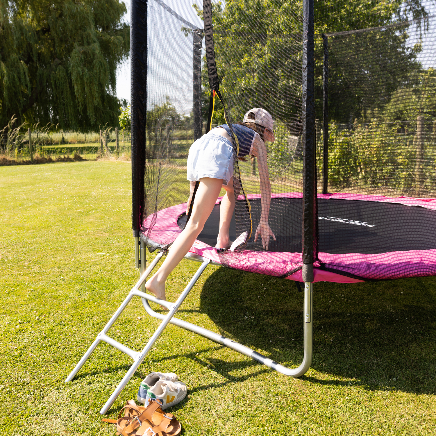 Pacote Premium Trampolim 245cm reversível rosa / cinzento CANBERRA + rede, escada, cobertura e kit de ancoragem