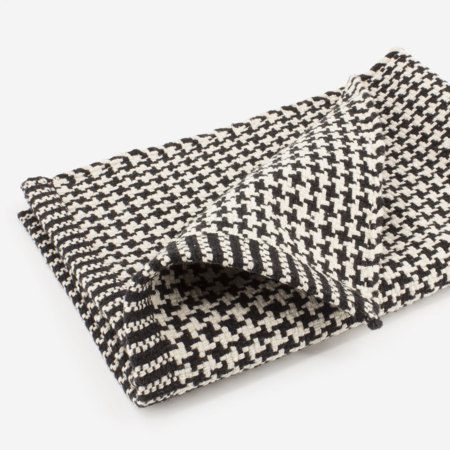 Tapis de bain noir et blanc pied de poule